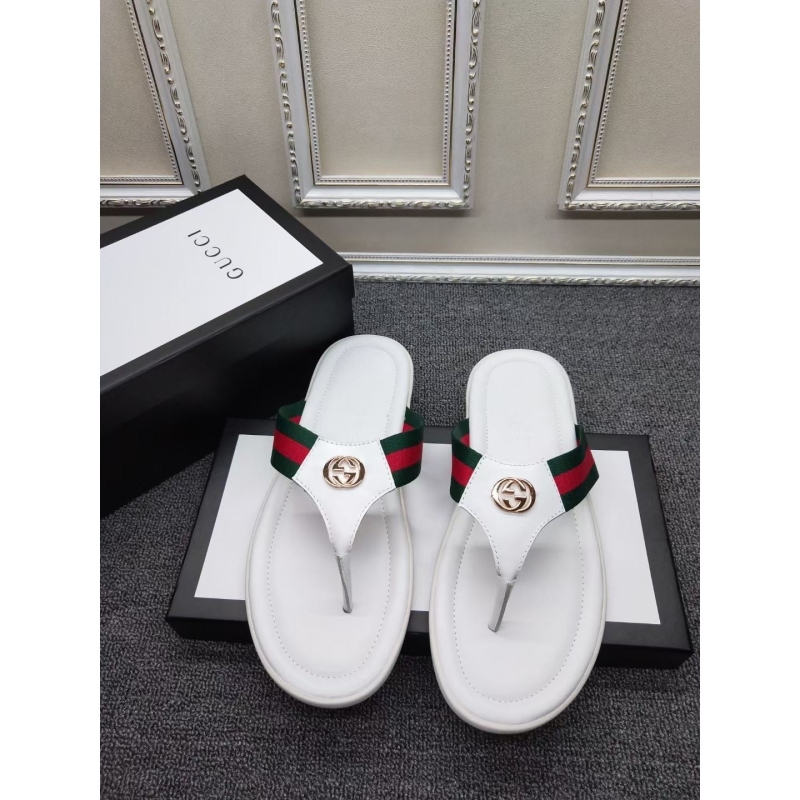 G*u*i slippers